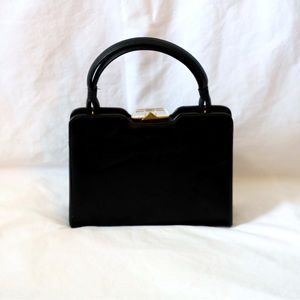 Vintage purse. Compact design, any size phone will fit